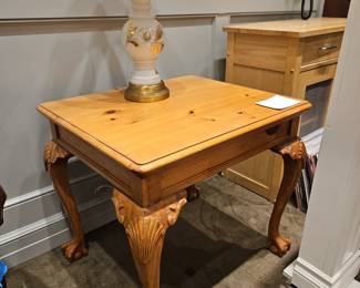 Wooden side table with ball and claw feet