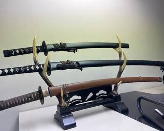 Three other collectible swords