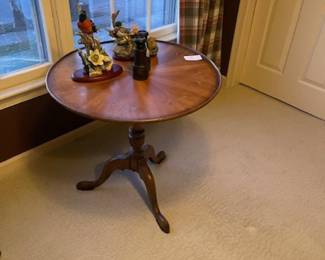 One of the small side tables