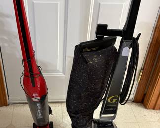 Kirby works well. No hose attachments!  We do have carpet shampoo system