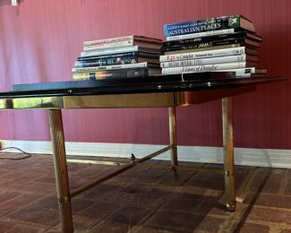 Thick glass topped coffee table - books are thick, too...