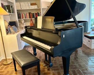 Samick grand piano ready to be played. Tuned regularly and last tuned last year. Never moved.