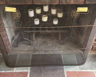 Light, functional Fireplace screen with brass handles for ease of removal and replacement