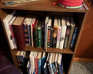 Small bookcase filled with books (NOTE:  more bookcases throughout the home, large and small, filled with books)