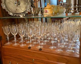 Gold rimmed wine glasses and champaign flutes