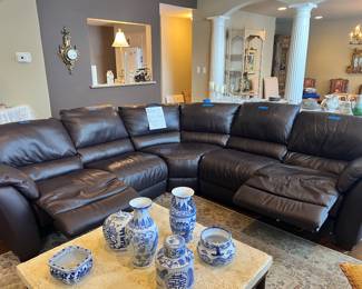 Natuzzi 5 Piece brown, leather sectional, with two recliners, on the right and left sides. Touhy Silvertone hallmark is on the right hand side recliner. This item is available for pre-sale.