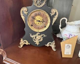 F. Kroeber “ Voltaire” mantle clock. 13 1/2 by 10 1/2.