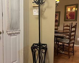 Pottery, barn, coat, and umbrella, rack, rot iron, incredibly heavy.