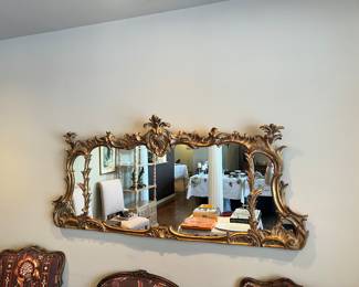 Fabulous horizontal ornate French style mantel mirror. 3 feet wide by 27 inches high, by 3 inches deep. Condition is excellent. This fabulous item is available for pre-sale.