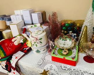 Christmas new in boxes--outside in garage we have another table filled with new in boxes items