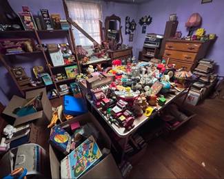 Purple bedroom View 2. Nothing is in the bathroom.  No running water, Non useable toliet.