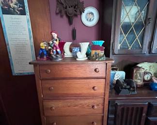 Clock shows an elk, pheasant and etc. wood?  ask for assistance