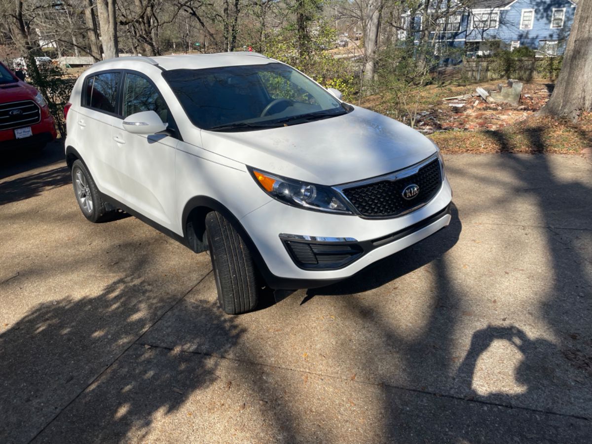 2015 KIA SPORTAGE  ONLY 8817 miles.