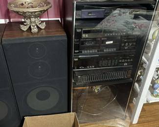 Rosenberg estate sale on 01/24/25 includes unique shelf decor in all style.