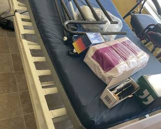 Rosenberg Estate Sale — medical bed with rails and mattress. 