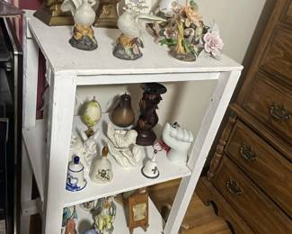 Rosenberg estate sale on 01/24/25 includes unique shelf decor in all style.