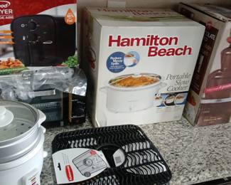several kitchen appliances, with the central item being a Hamilton Beach 4-Quart Portable Slow Cooker