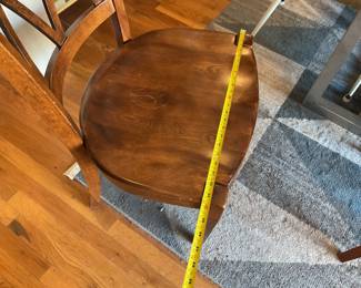 Hardwood lattice-style dining room chair. $35 + tax. 