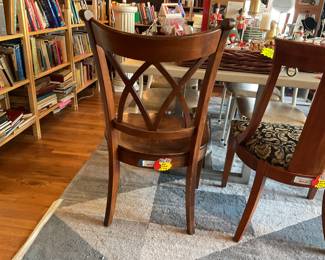 Hardwood lattice-style dining room chair. $35 + tax. 