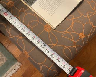 Brown and orange ottoman $15 + tax