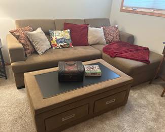 Hide a bed with lift top cocktail table