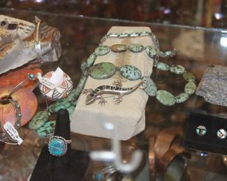 green turquoise and a really cute lizard