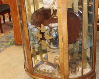 This is an absolute beautiful display case with pottery inside remember every thing is for sale