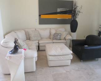 Leather Sectional & Ottoman, 9' X 9'.                                            Comfy Black Leather Occasional Chair.                             Abstract Wall Art, 72" X 48"