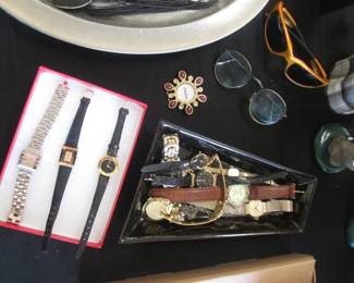 Assorted Watches. Vintage Oakley Straight Jacket Sunglasses. Vintage Ray-Ban Metal Frame Glasses.