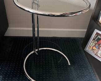 Eileen Gray E1027 side table. This classic side table has several height settings.