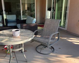 small outdoor table and 2 chairs