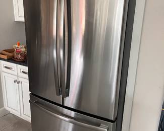 GE Standard Depth Fridge/freezer. There is also a second one in the garage in a little rougher shape but works fine.