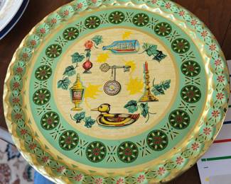 vintage metal serving tray is a Baret Ware piece featuring the "Lancaster" pattern with an "Art Grace" design. 