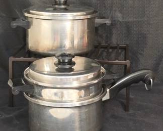 Saladmaster cookware set includes Dutch oven with lid, and 4-piece double boiler set