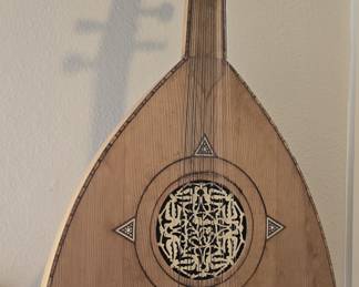 Middle Eastern Oud. Pear-shaped, fretless stringed instrument.  