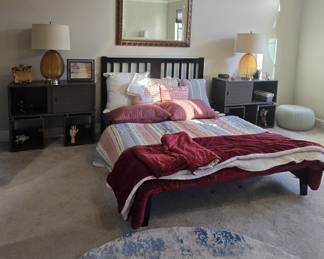 stackable storage - shown here as nightstands, bedframe with headboard, pair of amber glass lamps.  Bed coverings, bedspreads, bed pillows and decorative pillows, plus a really cool footstool