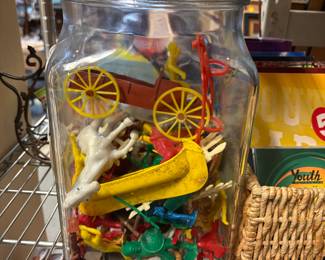 Vintage toys in a jar
