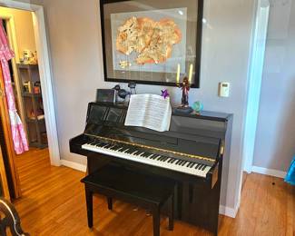 Japanese made Kawai CX-5 upright piano.