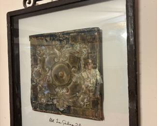 Framed old tin ceiling tiles