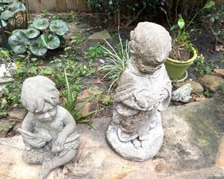 Small concrete statues
