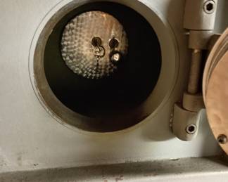 Upper 2 compartments with combo on outer door and 2 keys on inner door.