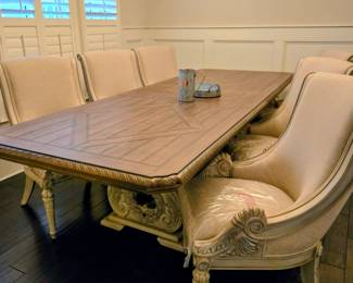 There is plastic on all the seats (pictured) protecting them.  The table and chairs are in perfect condition. STUNNING!!!!