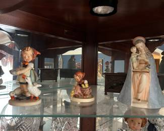 Far left: “Be Patient” Hummel, early50s or late 40s.. labeled Germany not West or Western Germany..Chick girl..                                                                 Middle: Hummel, likely mid 50s.. uses Western
Germany vs West German or W.German. likely during
transition period.  Far right: Flower Madonna Hummel..likely late 50s.. says Western Germany.