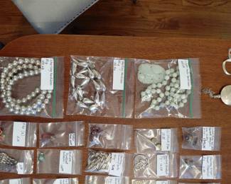 Pearls and vintage brooches