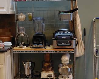 Chrome Bakers Rack and extensive kitchen equipment!