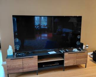 Gigantic Sony TV and beautiful TV stand