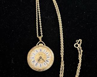 Lucerne gold tone pendant watch