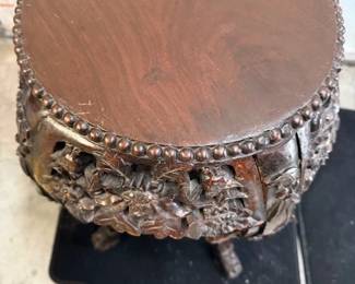 Solid wood. Carved. End table.  https://modestlambestatesales.hibid.com/