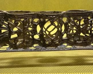 Vintage lipstick holder. https://modestlambestatesales.hibid.com/