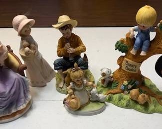 Collectible figurines.  https://modestlambestatesales.hibid.com/